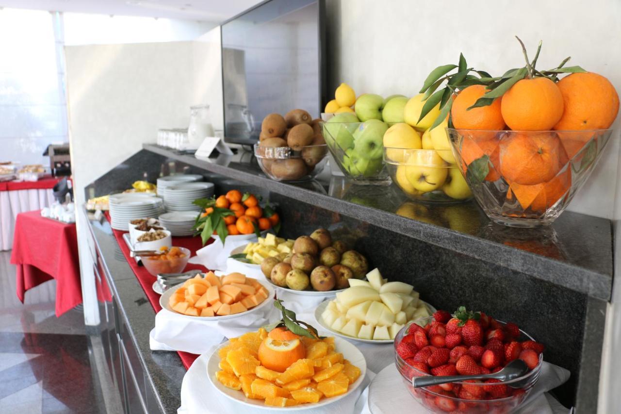 Ariha Hotel Cosenza เรนเด ภายนอก รูปภาพ