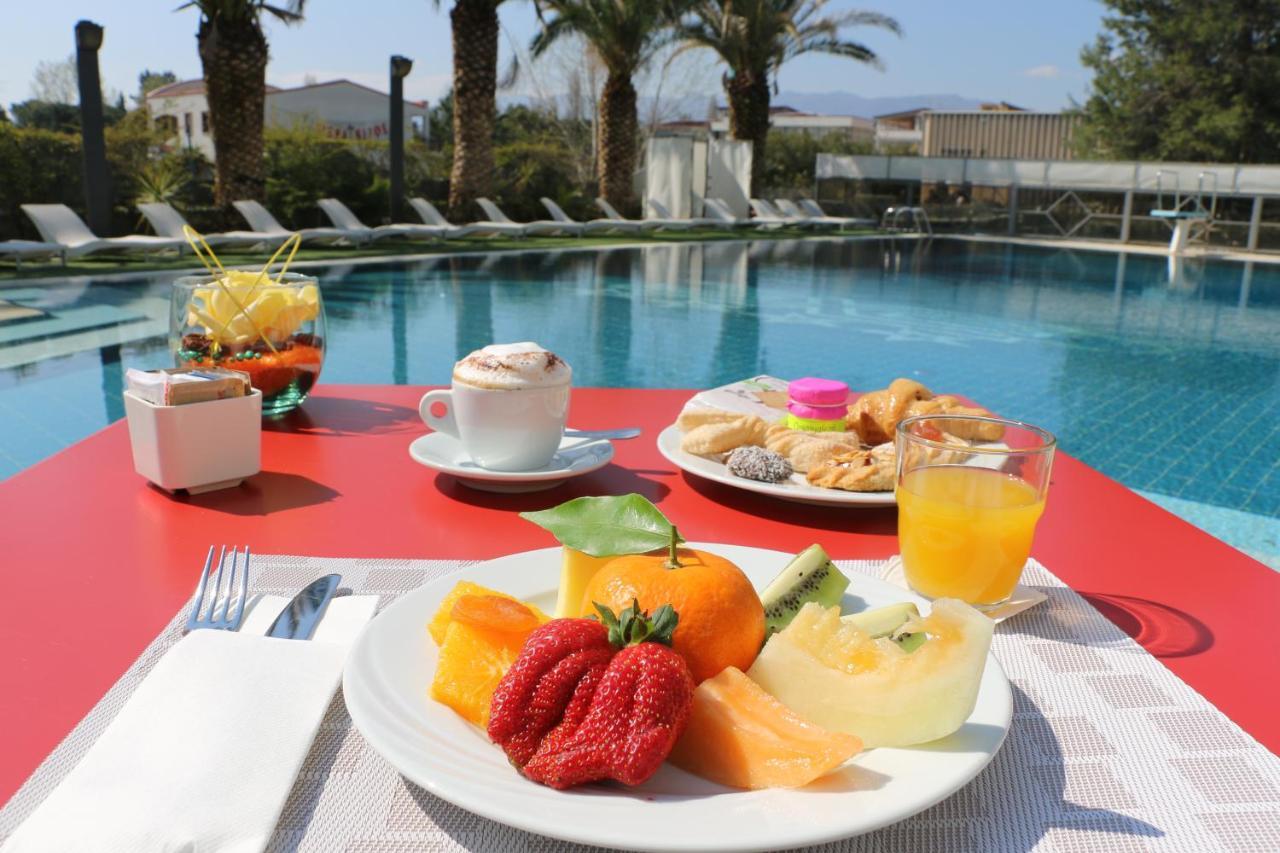 Ariha Hotel Cosenza เรนเด ภายนอก รูปภาพ