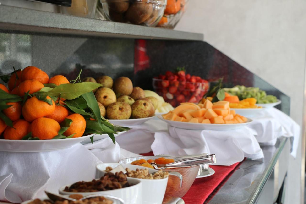 Ariha Hotel Cosenza เรนเด ภายนอก รูปภาพ